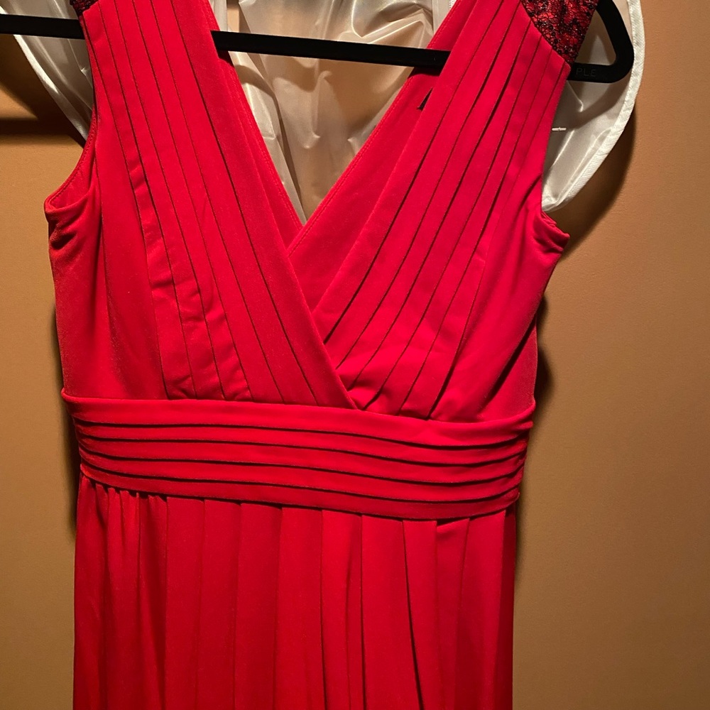 Gorgeous, red, knee length dress.